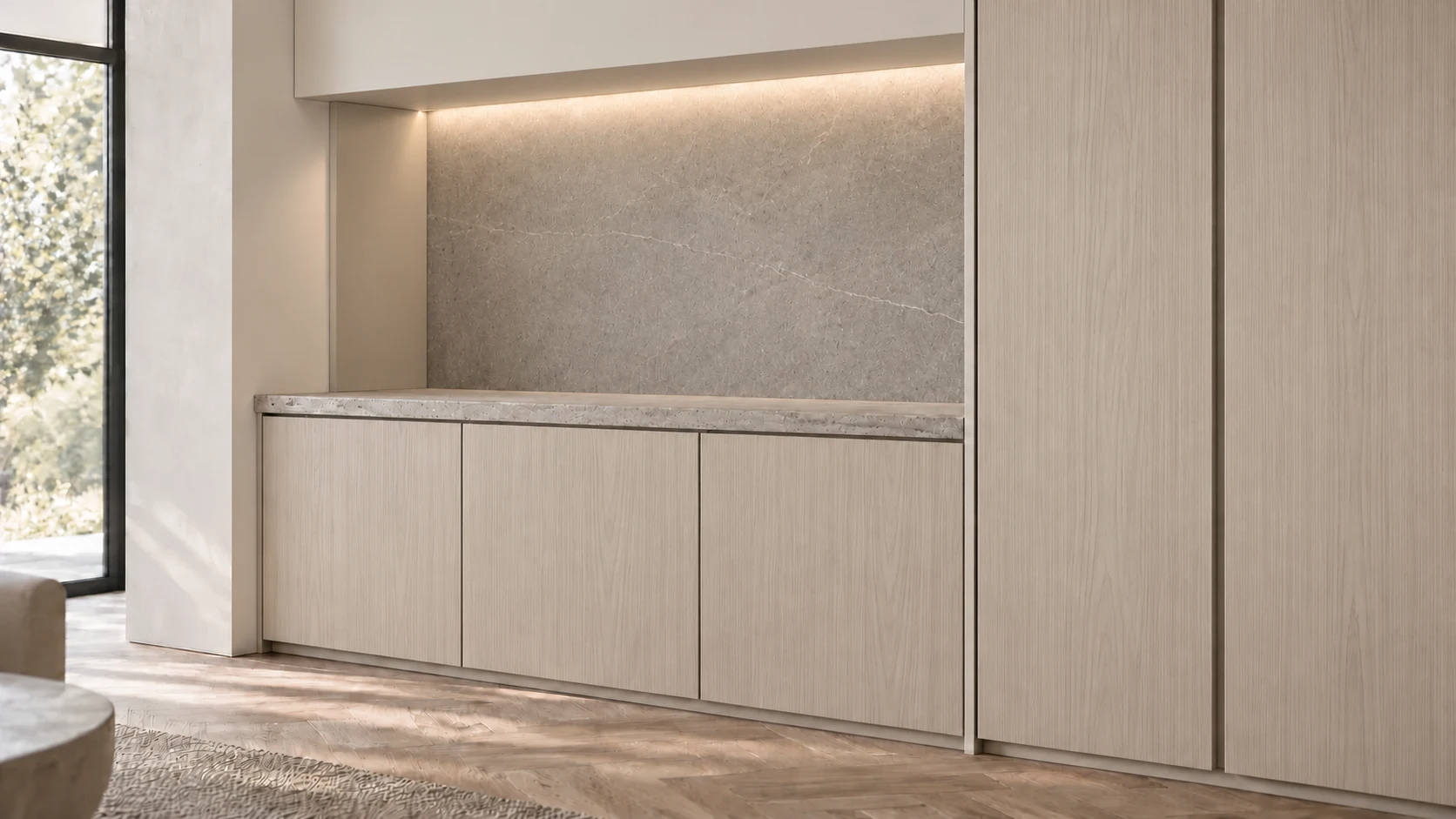 Interior concept: Pale neutral ash veneer, ivory finishes and honed stone.